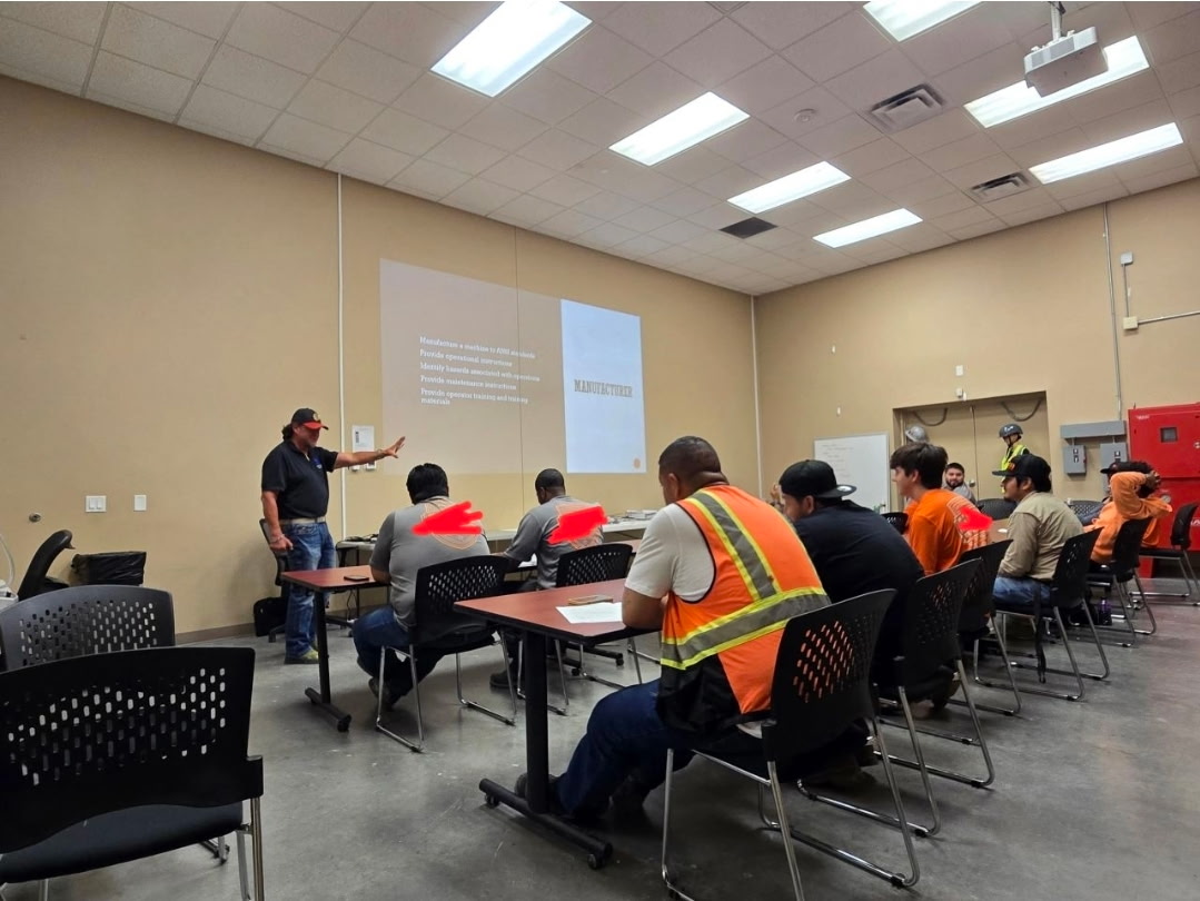 OSHA outreach instructor teaching a classroom of construction workers