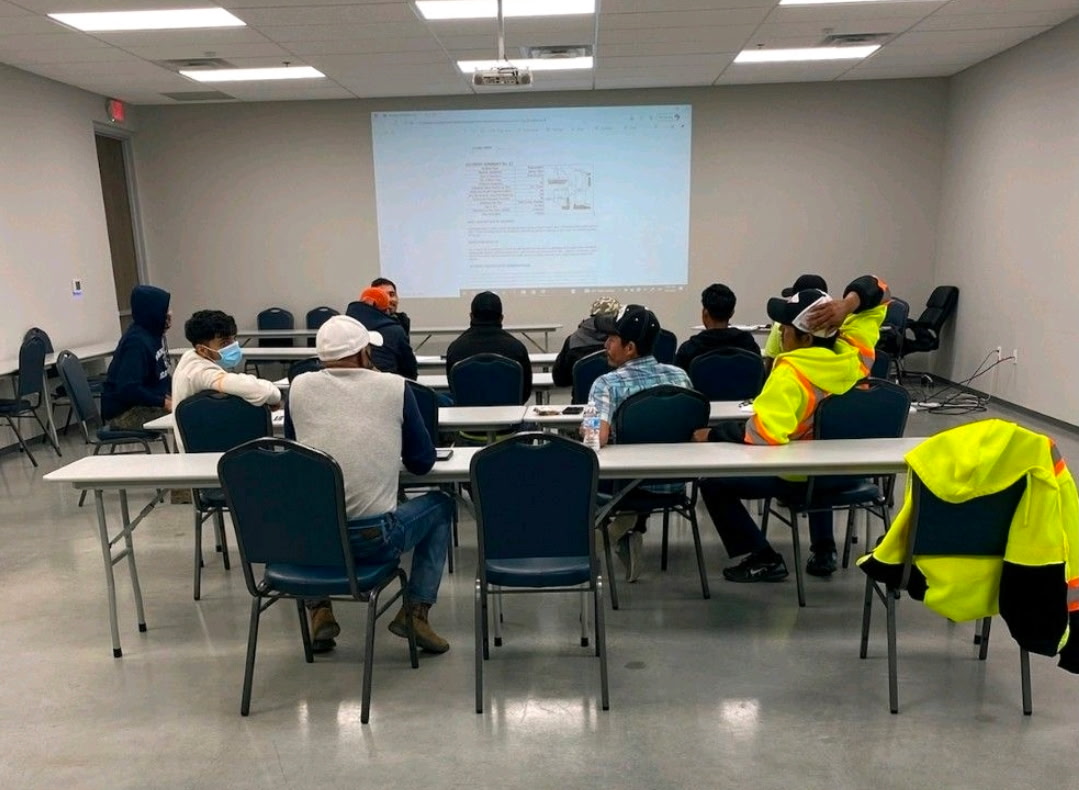 Workers completing the OSHA written test during a 10-hour outreach course